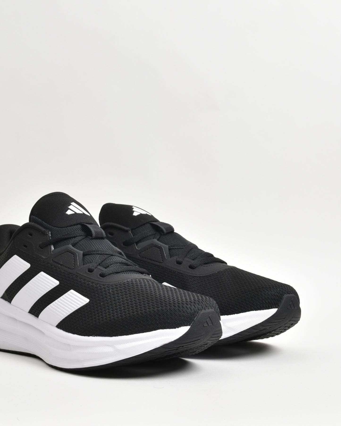 Adidas sneakers for men black and white