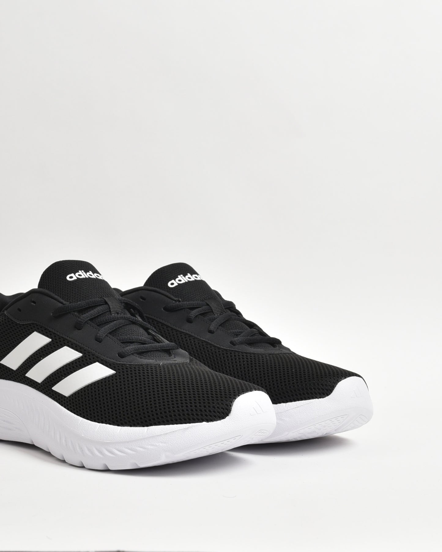 Adidas sneakers for men in black and white