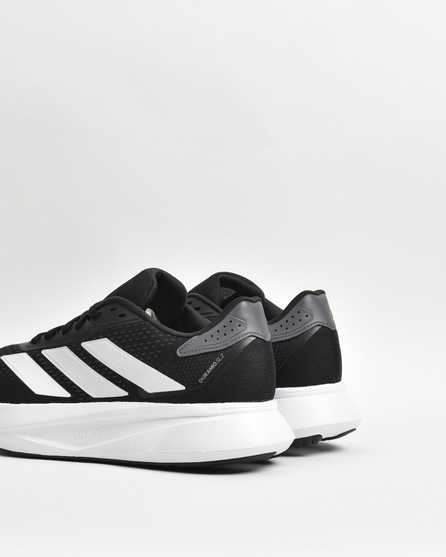 Adidas sneakers for men in black and white